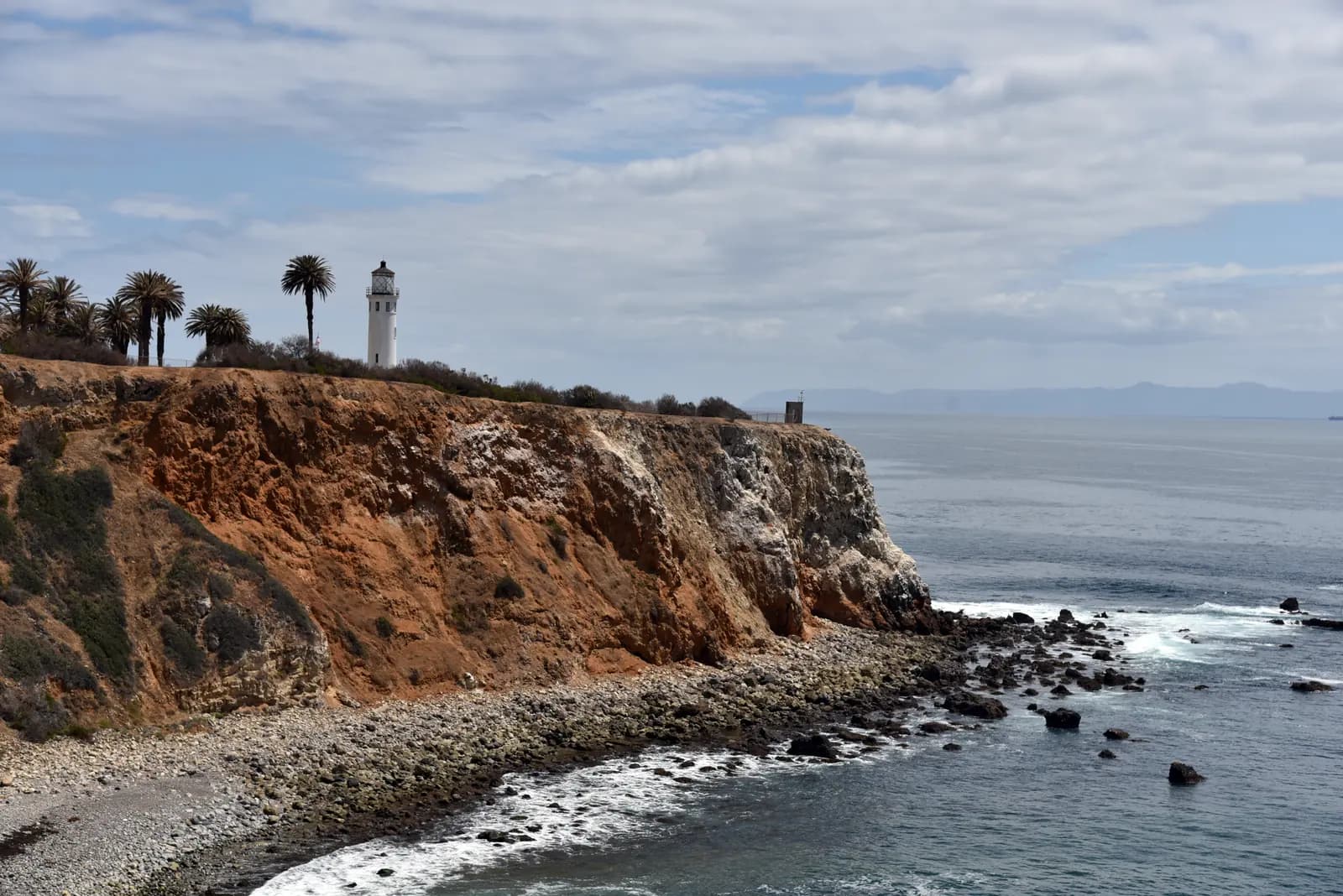 Point Vicente Lighthouse above the ocean and Catalina Island