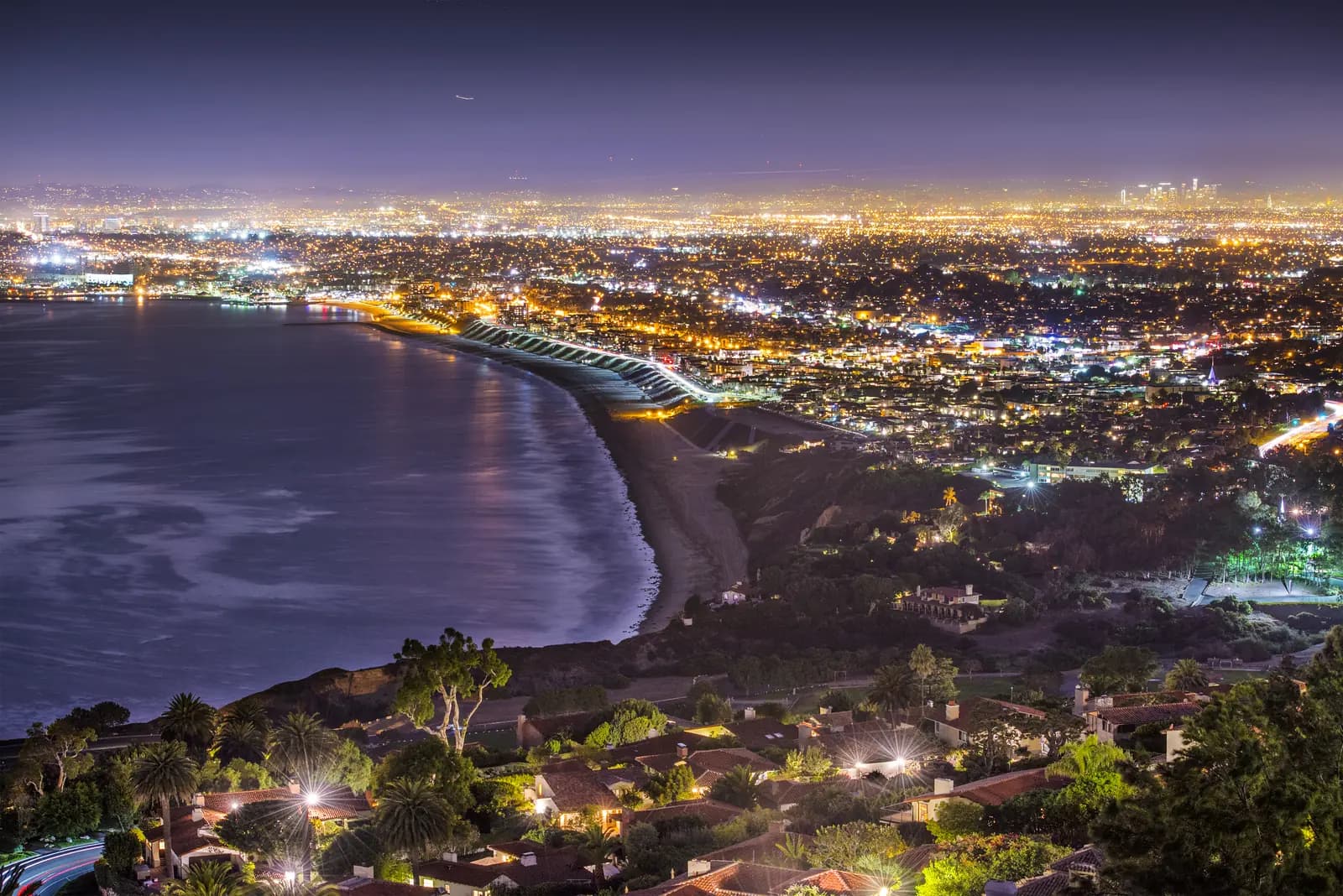 Night lights tracing the coast below Rancho Palos Verdes