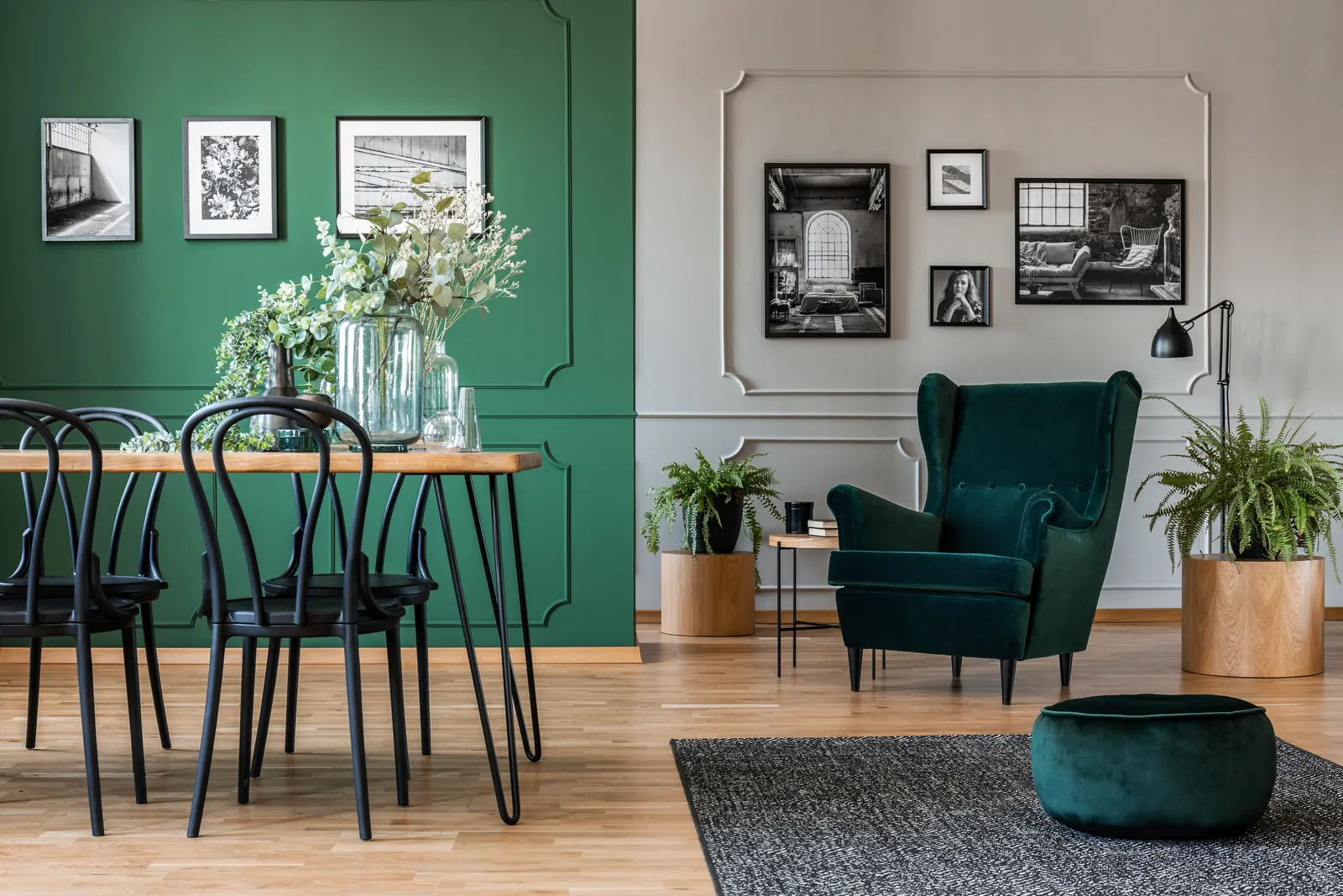 A welcoming green dining room prepared for service