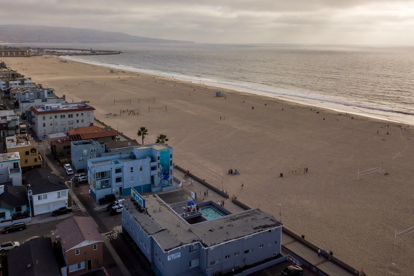 Hermosa Beach homes lining the shoreline near the pier