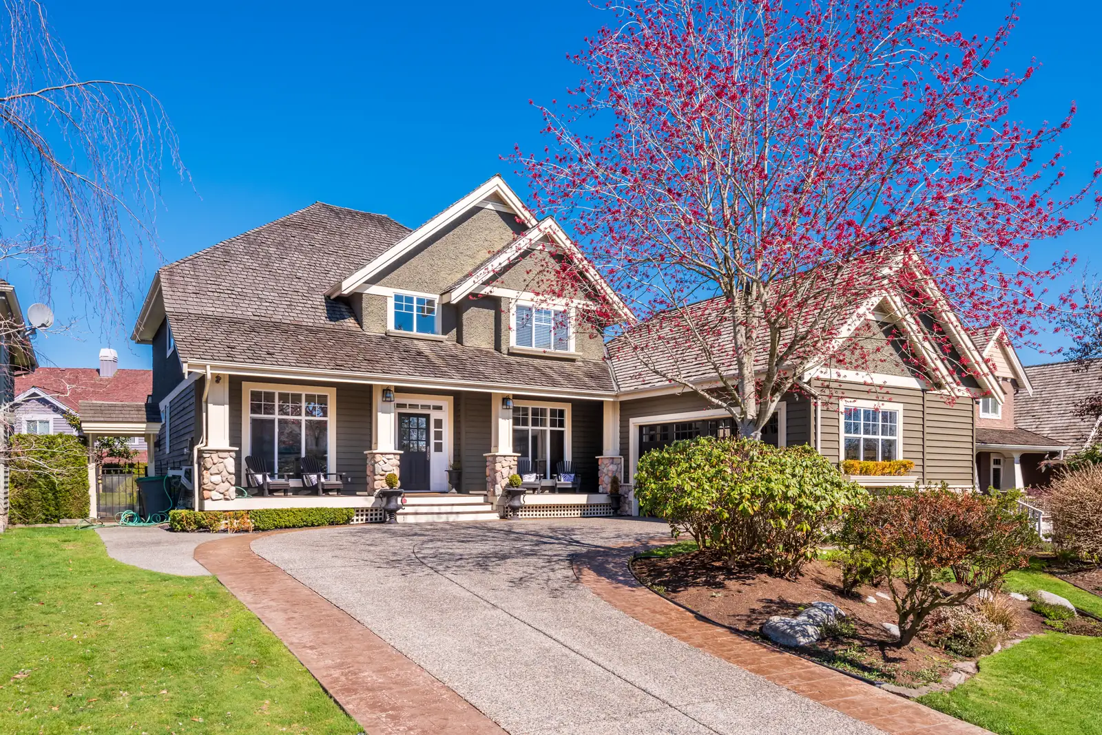 A discreet home exterior screened by established landscaping