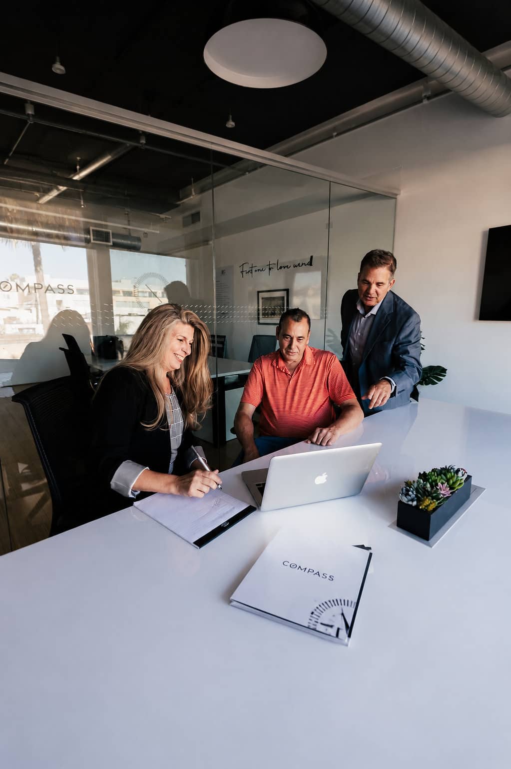 Randi and Stewart Fournier meeting with clients